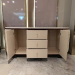 Oval Marble-Top Sideboard with Deep Button-Tufted Leather Panels and High-Gloss Lacquer Frame